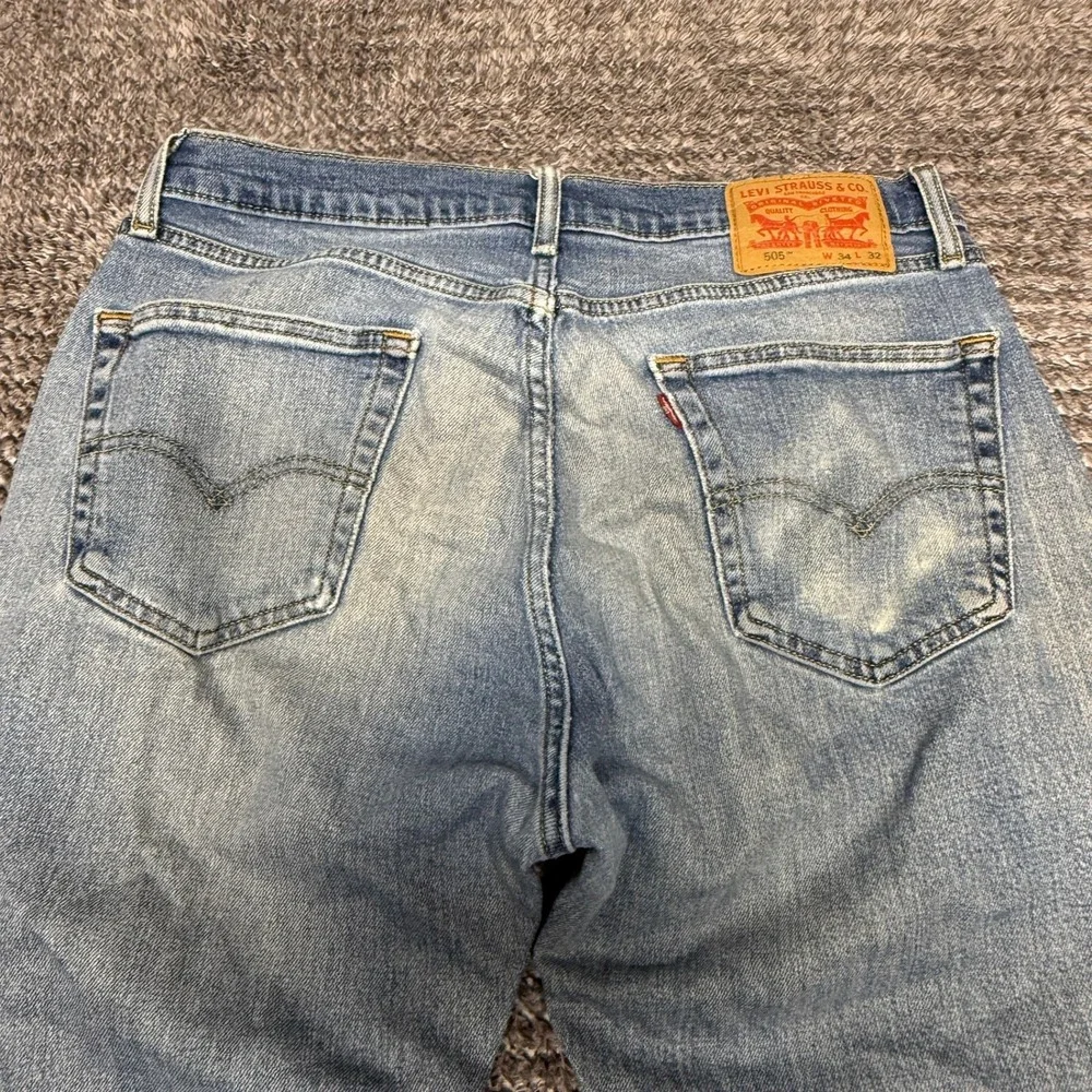 Levis‎ Mens 505 Jeans W34 L32 Light Wash Blue Distressed Regular Fit